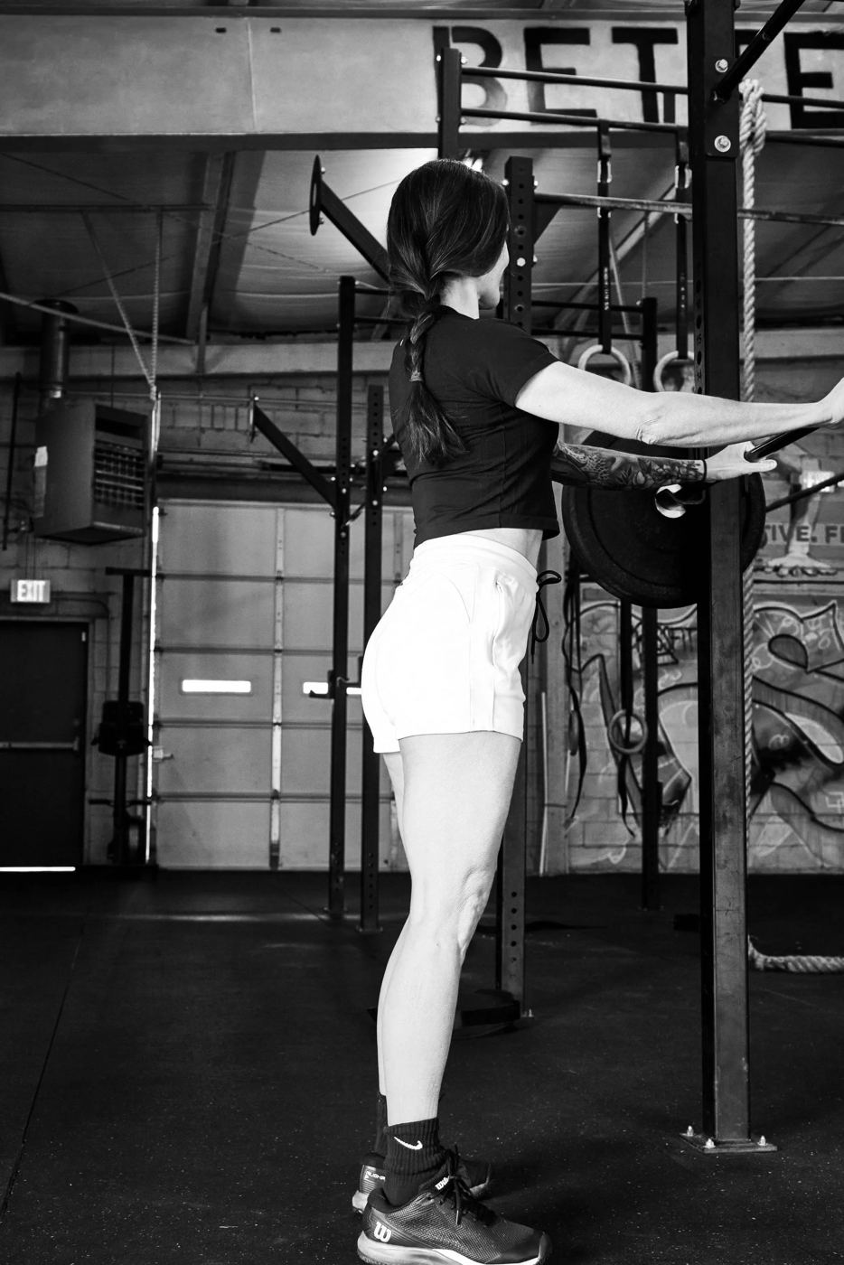 Erica stretching in the gym